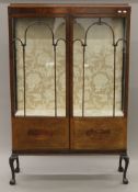 An Edwardian mahogany display cabinet. 114 cm wide x 176 cm high.