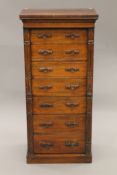 A 19th century rosewood Wellington chest. 59 cm wide x 127.5 cm high.