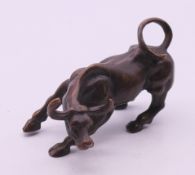 A bronze water buffalo. 6.5 cm long, 4 cm high.