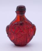 A snuff bottle and stopper. 7.5 cm high.