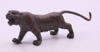 A bronze tiger. 14 cm long.