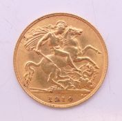 A 1914 George V gold half sovereign.