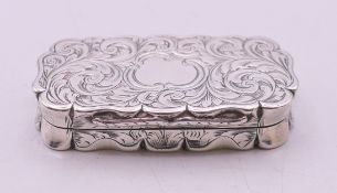 An early Victorian silver vinaigrette with elaborately-worked inner grill by Edward Smith