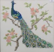 A hand-embroidered panel of a peacock in a tree, framed and glazed. 50 x 49 cm overall.