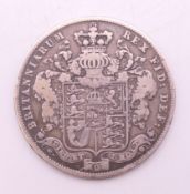 An 1826 George IV silver half-crown coin.