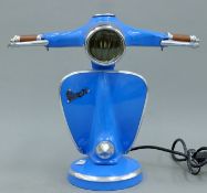A metal 'Vespa' lamp. 35 cm high.