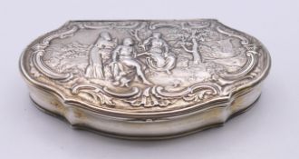 A 19th century Continental silver trinket box, the lid decorated with classical figures.