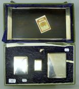 A cased Japanese hardwood, silver and silver-plated smoker's set comprising a tray,