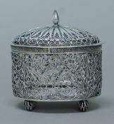 A Chinese silver filigree lidded box. 9 cm wide. 105.6 grammes.