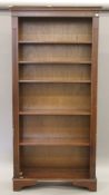 A tall modern wooden bookcase. 90 cm wide x 185 cm high.