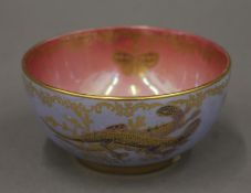 A Crown Devon Lustrine Fielding's porcelain bowl decorated with lizards and butterflies. 11.