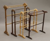 Four various wooden towel rails. The largest 78 cm long x 91 cm high.