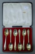 A boxed set of six silver teaspoons. Each 12 cm long. 129.3 grammes.