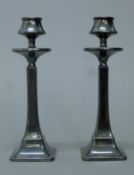 A pair of silver candlesticks. Each 19.5 cm high.
