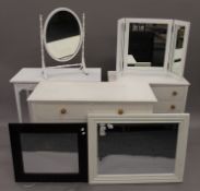 Two white painted chests of drawers, a white painted three-drawer dressing table,