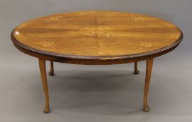 A Victorian and later walnut coffee table. 115 cm long.