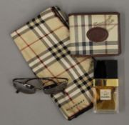 A pair of Chanel sunglasses, a bottle of Chanel No.