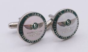 A pair of Bentley cufflinks in a Hackett of London box. 2 cm diameter.