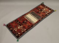 A vintage camel's saddle bag. 160 cm long.