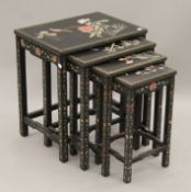 A chinoiserie nest of four tables. 56 cm wide.