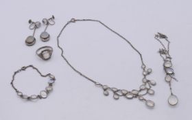 A quantity of moonstone jewellery, including a ring, a pair of earrings,