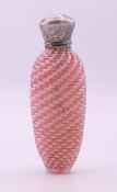 A Victorian pink and white lattice glass scent bottle with silver top and original stopper. 9.