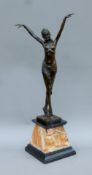 An Art Deco-style bronze of a dancing girl. 55 cm high.