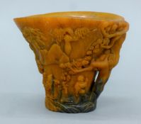 A libation cup. 10 cm high.