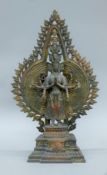 A bronze multi-armed and multi-faced Buddhist deity. 40 cm high.