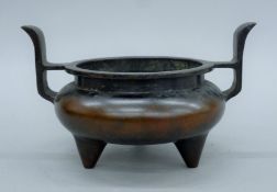 A Chinese bronze censer. 23.5 cm wide.