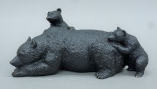 A bronze model of a bear and two cubs. 23 cm long.