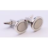 A boxed pair of Lindenmann cufflinks. Each 1.5 cm wide.