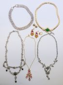 A quantity of vintage costume jewellery. The pink stone-set pendant 5 cm high.