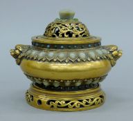 A jade and turquoise-mounted bronze lidded censer on stand. 16 cm wide.