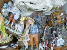 A quantity of various resin figurines and two small cabinets containing thimbles.