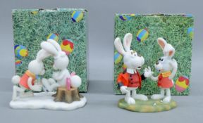 Two boxed Peter Cottontail figures. Each approximately 10 cm high.