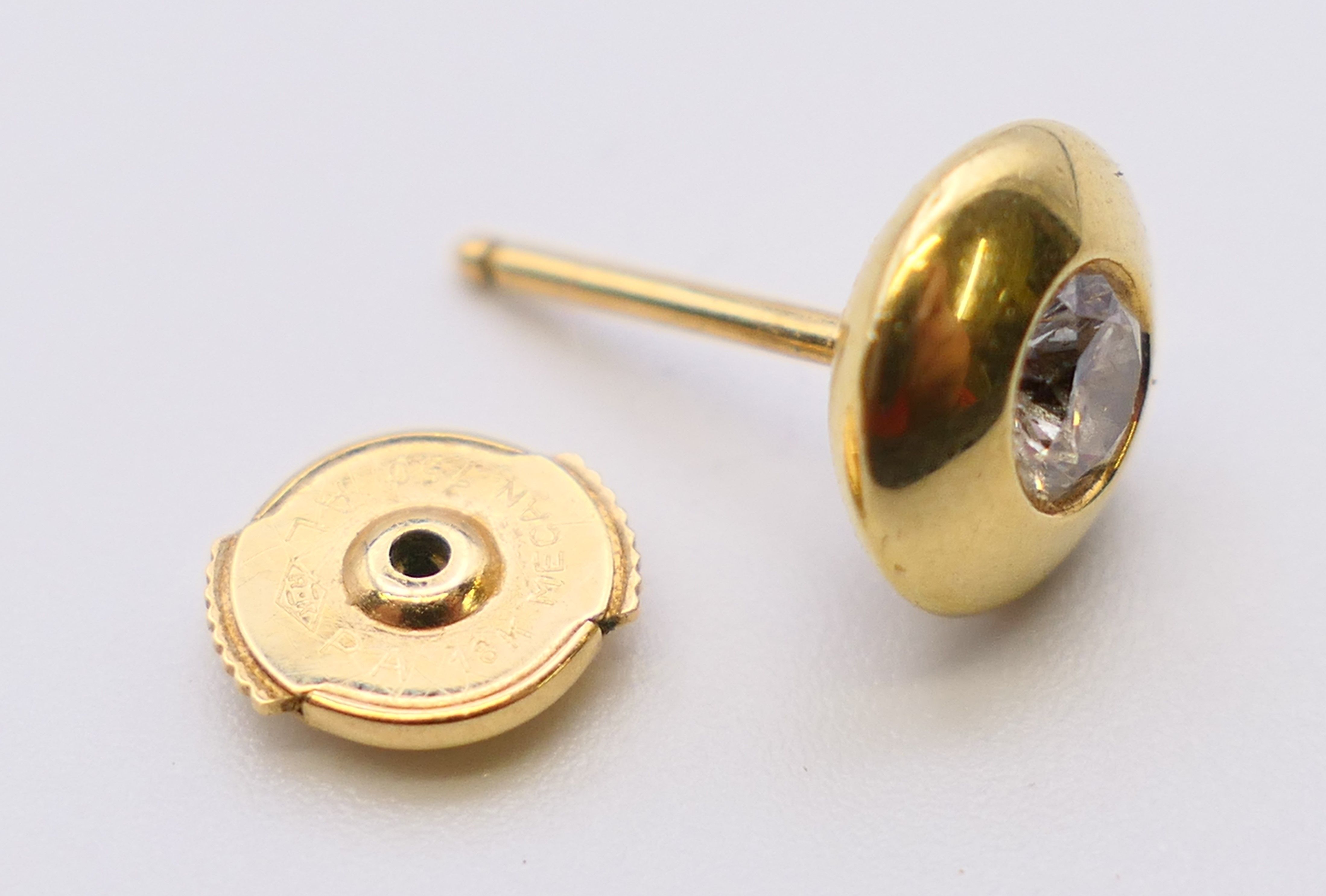 A pair of 18 ct gold and diamond ear studs, each stone approximately 0.25 ct. Each 8 mm diameter. 3. - Image 5 of 5
