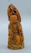 A resin model of a Chinese fisherman. 13 cm high.