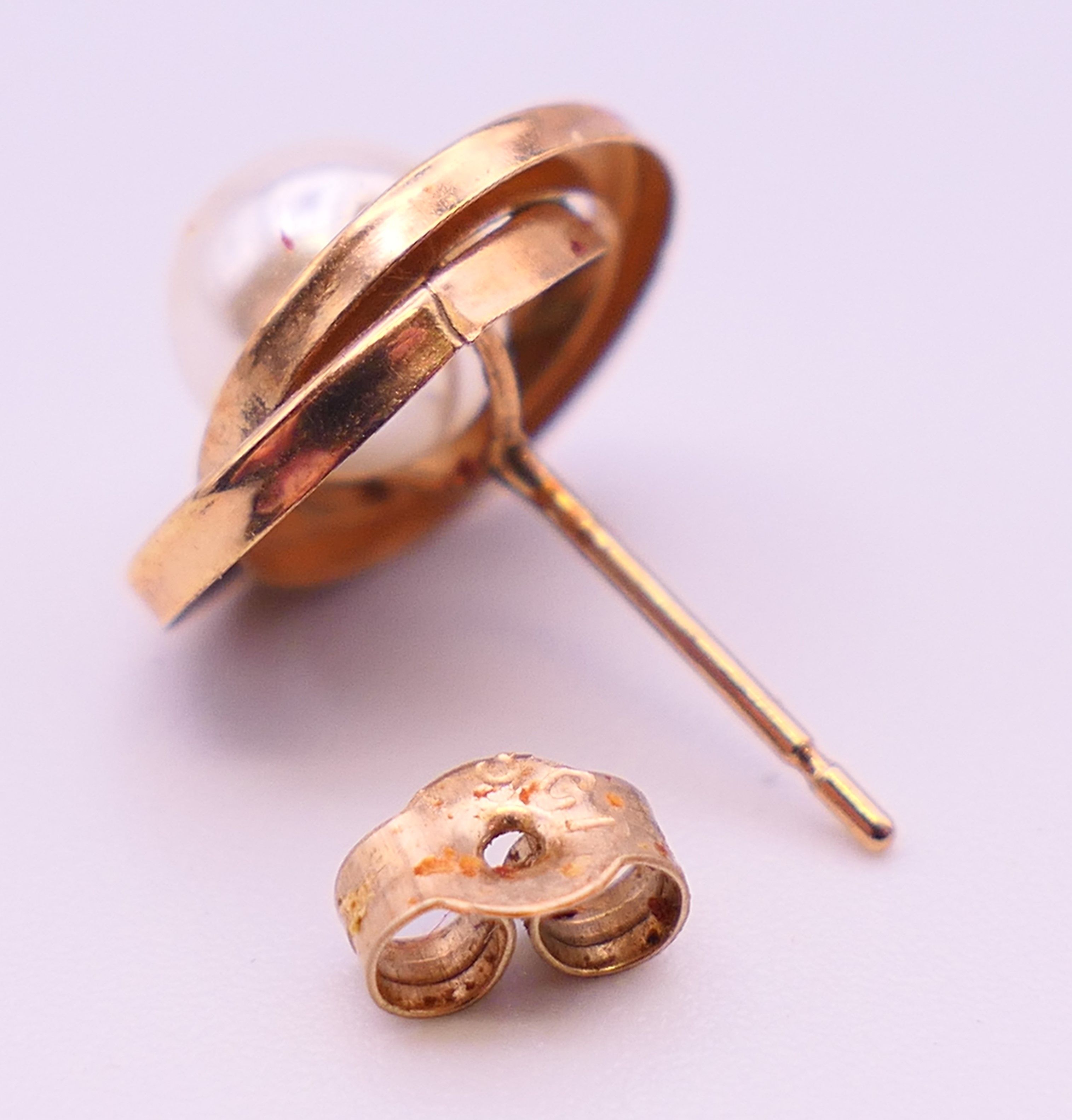 A quantity of various gold and other earrings. The coral pair 8 mm high. 34.6 grammes total weight. - Image 3 of 5