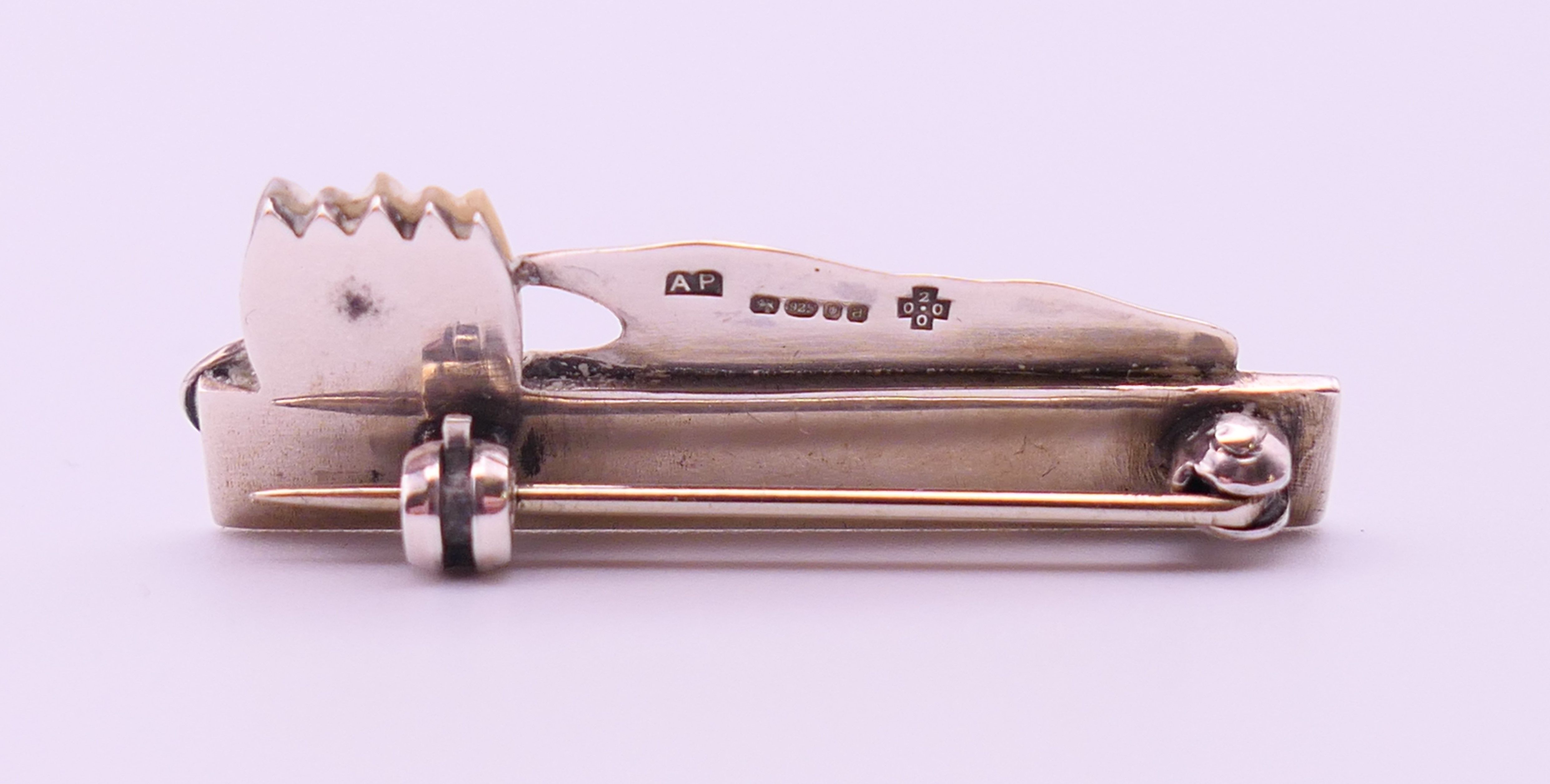 An Ann Powell handmade one-off silver, gold and mother-of-pearl brooch decorated with a lily. 3. - Image 3 of 5