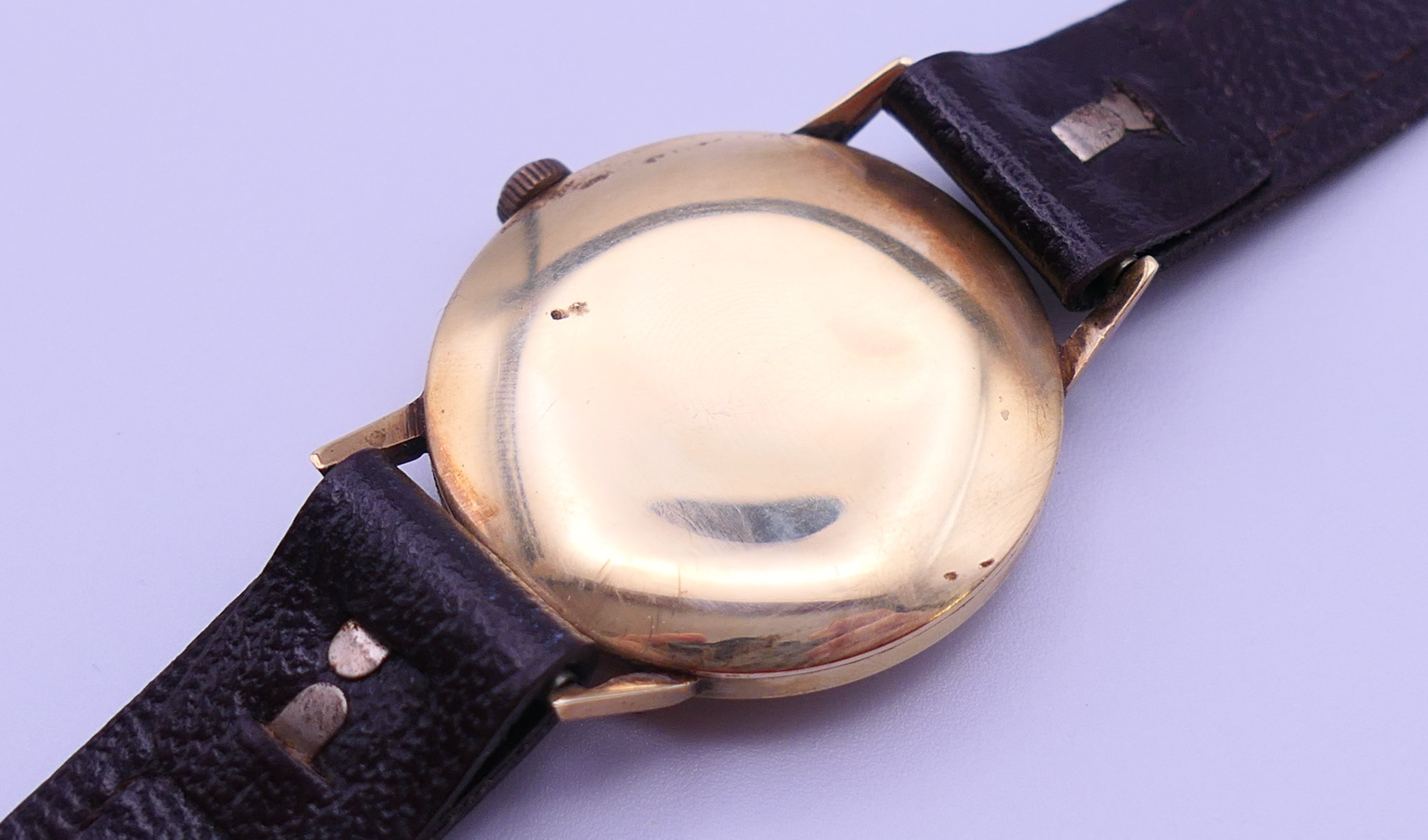A 9 ct gold Tissot gentlemen's wristwatch. 3.5 cm wide. 30.8 grammes total weight. - Image 5 of 7