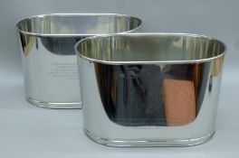 A pair of 'Lily Bollinger' coolers. 42.5 cm long.