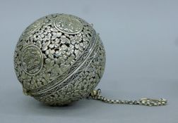 A Chinese white metal travelling censer. 10 cm high.