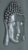 A silvered Buddha wall hanging. 58 cm high.