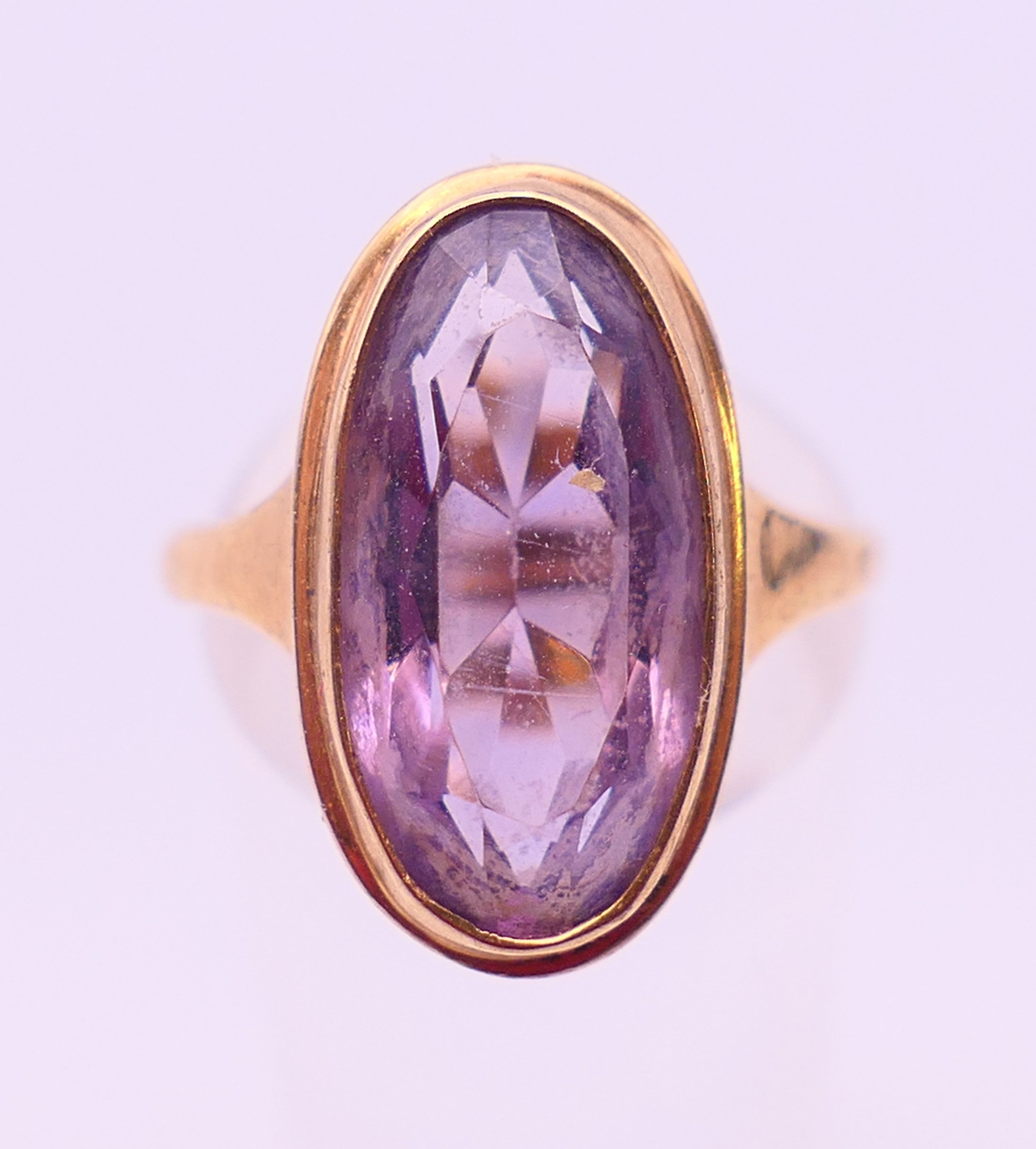 A 9 ct gold amethyst ring. Ring size L. 4.7 grammes total weight.