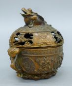 A Chinese bronze censer surmounted with a money toad. 9 cm wide.