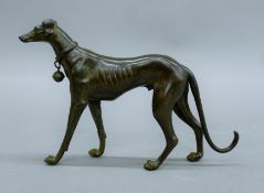 A bronze model of a greyhound. 18 cm long.