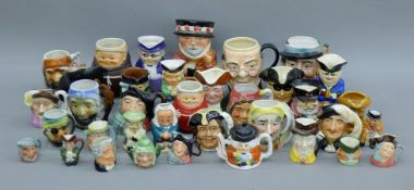 A collection of porcelain Toby and character jugs. The largest 19 cm high.