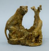 A bronze model of two tigers. 15 cm high.
