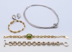 A small quantity of silver designer jewellery, including a pair of Georg Jensen earrings.